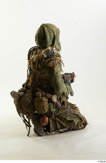 Photos John Hopkins Army Postapocalyptic Suit Poses kneeling whole body…